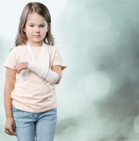 Child with bandaged arm