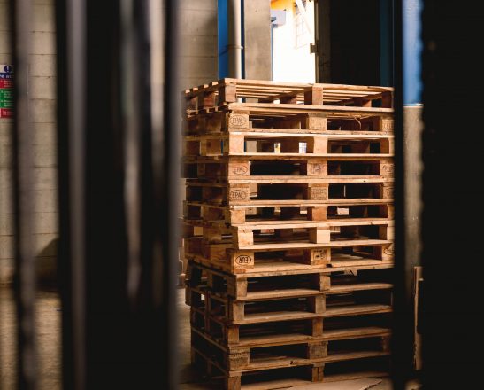 a stack of thin wooden crates