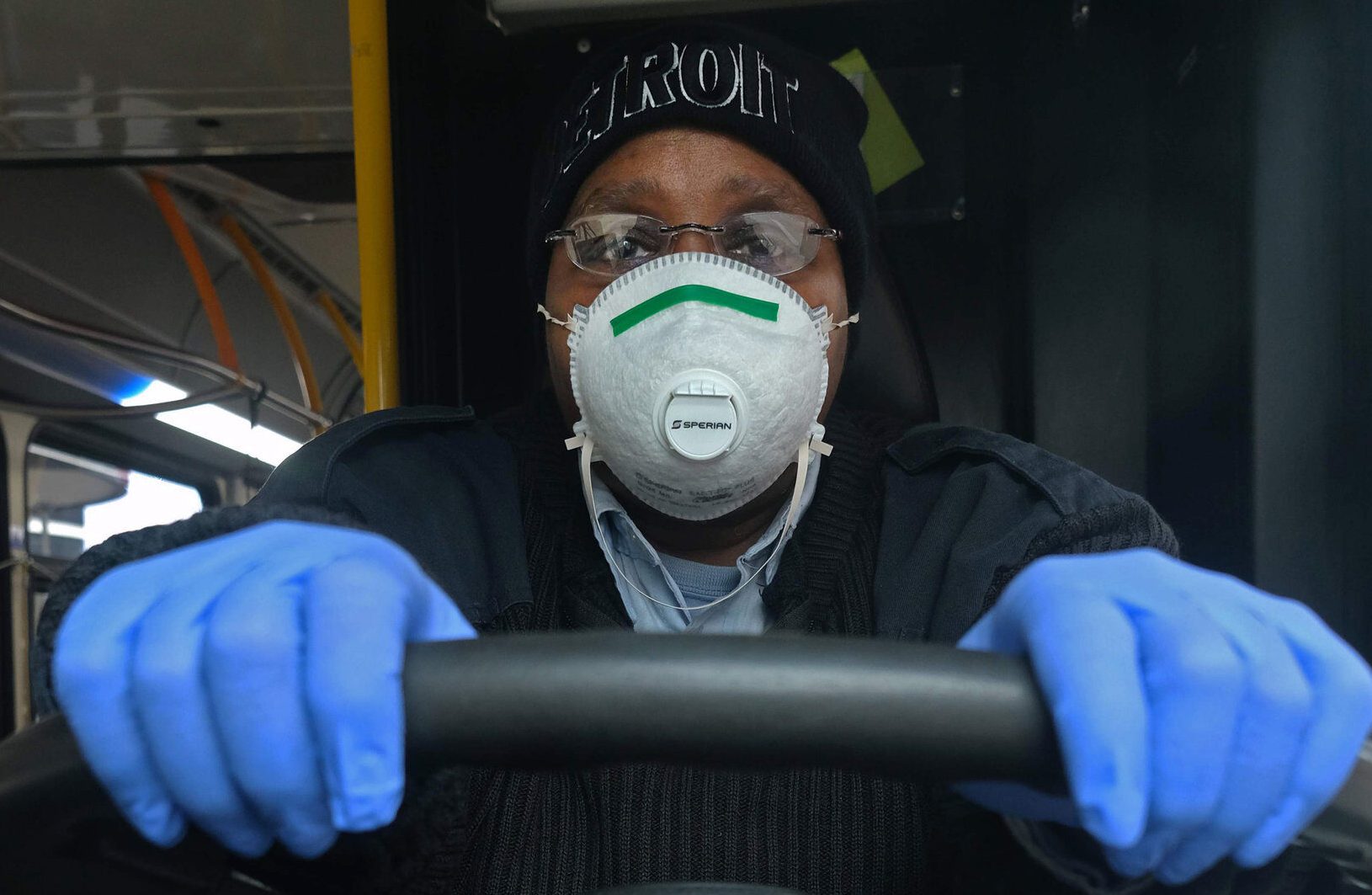 a woman driving a bus